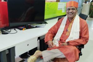 Shailesh Limaye sitting at his desk