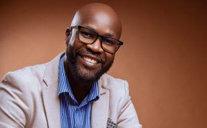 A headshot of voice actor Dan McCharles